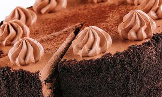 Chocolate Cake with Chocolate Fudge Drizzled Icing and Chocolate Curls photo