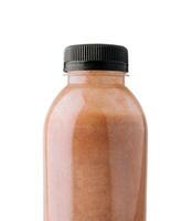 chocolate smoothies in plastic bottles on white photo