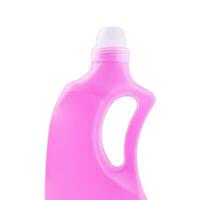 Plastic clean bottle with pink detergent photo