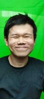 asiático genuino sonrisa facial expresión foto