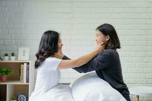 Happiness LGBTQ couple woman spending time together at home photo