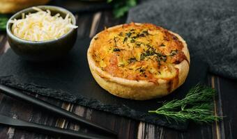 Cheddar cheese and spring onion omelette tarts served on wooden board photo