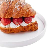 strawberry and fresh cream croissant on plate photo