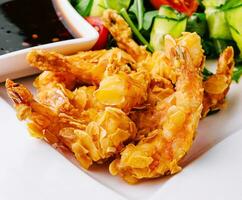 Fried Shrimp Salad with soy sauce photo