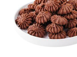 Stack of chocolate chip cookies on plate isolated photo