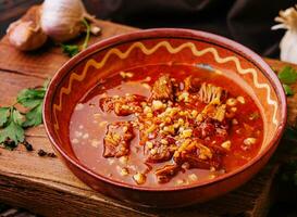 Mexican hot chili con carne in a bowl photo