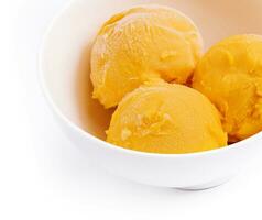 Mango ice cream, sorbet in a plate photo