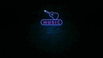 Animation of the word music at neon light with a guitar shape in a urban wall at night video
