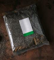 el plastico transparente bolso con medio amapola semillas foto