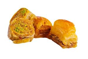 Baklava with pistachio isolated on white photo