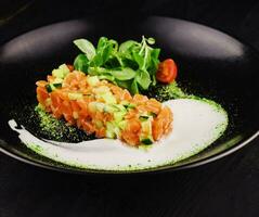 Fresh tartar with salmon and cucumber photo