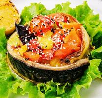 Baked mackerel with sesame and lemon and vegetables photo