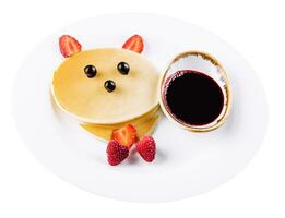one pancake with strawberries and raspberries photo