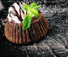 Chocolate brownie with vanilla ice cream photo