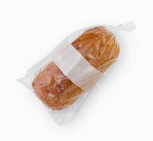 Bread in Cellophane Bag on White Background photo