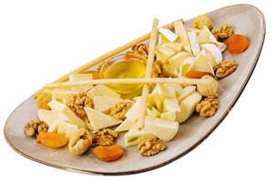 cheese plate with walnuts and honey photo