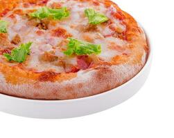 Mini pizzas with ham and mozzarella cheese photo