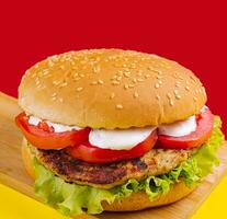 Burgers with cutlet, tomato and lettuce photo