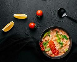 Tasty Malaysian Soup with prawn and coconut milk photo