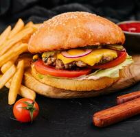 Burger, hamburger with french fries cutting board photo