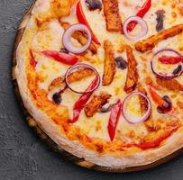 Top view barbecue chicken pizza with vegetables photo