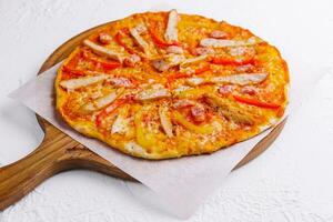 Bavarian pizza with smoked sausages isolated photo