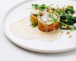 Meatloaf with mushroom sauce and walnut salad photo