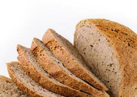 Black bread with seeds on white photo