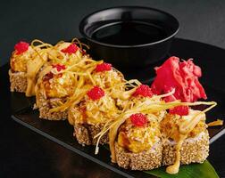 Baked sushi with cheese and sesame seeds photo