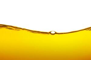 Oil wave background, yellow liquid, on white background. photo