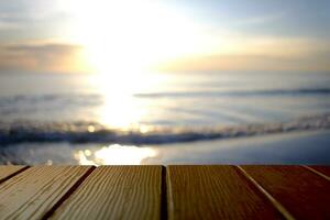 Beautiful foreground wooden floor and blue sea and sky background. photo