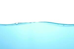 The surface of the water. White background. Movement. Close-up view. photo