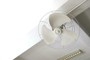 Electric ceiling fans in an incomplete condition inside a building. photo