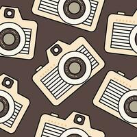 Minimalistic seamless pattern light vintage camera in retro colors isolated on a brown background. Background, backdrop, wrapping paper, sepia tone. vector