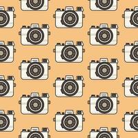 Cute seamless pattern light vintage camera in retro colors isolated on a beige background. Background, backdrop, wrapping paper. vector