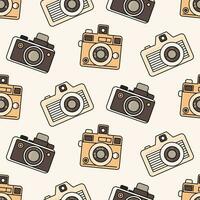 Seamless cute pattern three vintage cameras isolated on a light background. Background in retro colors, backdrop, wrapping paper, sepia tone. vector