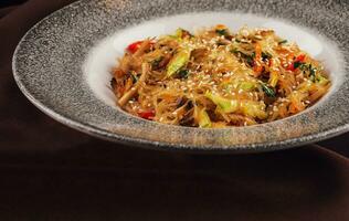 Asian dish glass noodles with vegetables photo