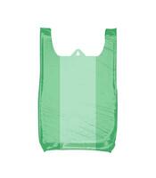 Green plastic bag isolated on white background photo