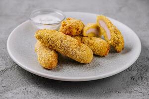 Chicken golden nuggets in plate photo