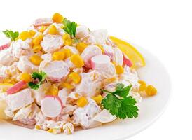 Salad of chopped crab sticks with sweet corn photo