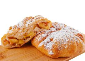 Baking puff pastry vertuta with apple or strudel photo