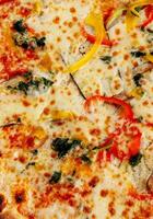 italian vegetarian pizza on closeup background photo