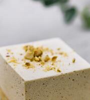 Souffle cake with nuts close up photo