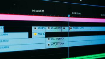 The movie editor highlights, selects, and moves footage in a timeline editing project in a computer program macro mode. time-lapse editing of a TV show, film. video