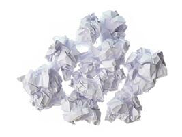 crumpled paper ball on white background photo