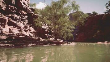 beautiful day on the river with sandstone cliffs and reflections video