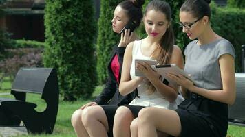 Three business women discussing a partner obtained a deal video