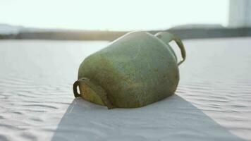 old rusted metal gas tank on the beach video