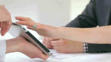 Close-up of hands, young attractive couple customer consults video