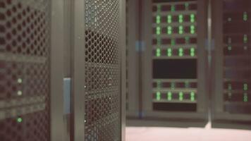 Rows of powered supercomputers in a server room video